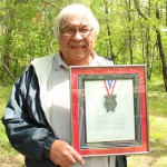 Among Peter Beaucage’s many honours is  a Medal of Distinction from The Nechi Training, Research and Health Promotions Institute, which for 38 years has offered specialized training to addictions counsellors working in Aboriginal communities. The citation acknowledges Peter for his contributions to 'the Nipissing First Nation cultural revival…and the sobriety of many Northern Ontario communities.'    – Photo by Lisa Abel
