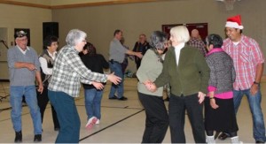 Square dancers – including Judy Syrette and Alice Corbiere, foreground, enjoy themselves at the Classic Country Sundays Holiday Festival in Garden River.