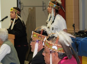Anishinabek Nation Grand Council Chief Patrick Madahbee and Deputy Grand Council Chief Glen Hare listen to Anishinabek Youth representatives Nathalie Restoule and Quinn Meawasige speak at the Anishinaabe Kinomaadswin Nongo Anishinaabe Pane – Education Summit on April 23 in Nipissing First Nation.  