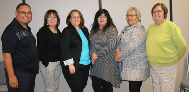 Representative Directors of the Board of the Kinoomaadziwin Education Body are, left to right: Charles Shawanda, Whitefish River, Regional Education Council (REC) #3; Claire Onabigon, Long Lake #58 and Valerie Auger, Pays Plat, REC #1; Della Charles, Mississaugas of Scugog, REC #5; Vice-Chair Debbie Mayer, Mississauga #8, REC #2; and Muriel Sawyer, Nipissing, REC #4. Not available for the photo were Chair Lloyd Myke, Magnetawan, REC # 4; Secretary Julia Pegahmagabow, Atikmeksheng Anishinawbek, REC #2, and Candee Thomas, Munsee Delaware, REC #5. 