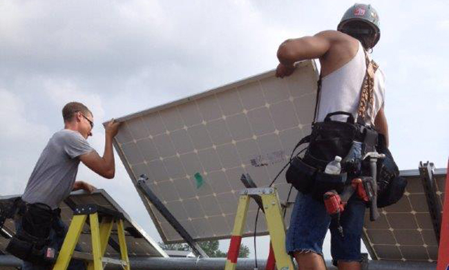 Solar panels being installed in Alderville First Nation.