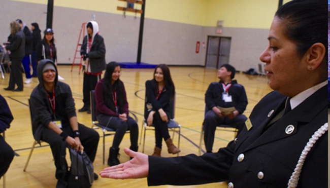 Nishnawbe-Aski Police Service sergeant Jackie George participates in a group session with students during the Feb. 18 career fair at Dennis Franklin Cromarty First Nations High School in Thunder Bay.