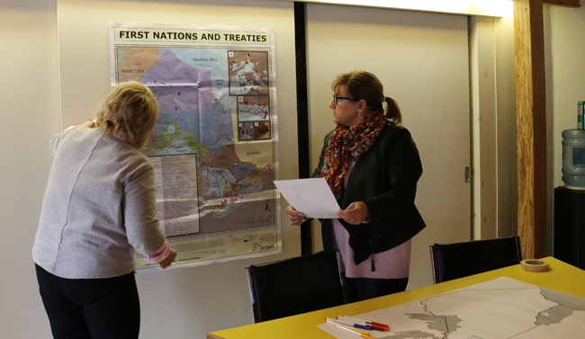 Teachers participate in the 'mapping treaties' activity at the teachers training session held at the Union of Ontario Indians head office. 
