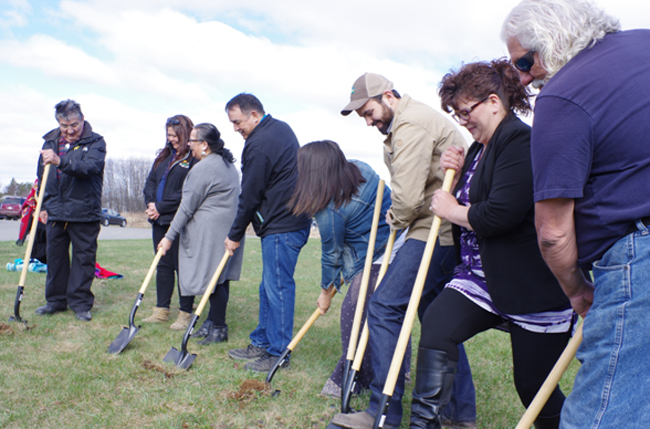 Fort William chief and council members break ground on May 4 with Ontario Works and Roots to Harvest representatives and community members for the new Ontario Works Community Garden near the Social Services office.
