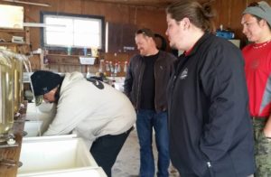 Chief Scott McLeod watches as work is done at the Nipissing First Nation hatchery. Photo courtesy of Nipissing First Nation Facebook page.